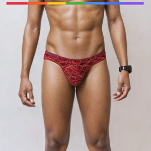 Bañador tipo slip en rojo escarlata con estampado orgánico abstracto. Diseñado para quienes marcan el ritmo del verano con elegancia, sensualidad y seguridad. Edición especial de BELTRIMEN.